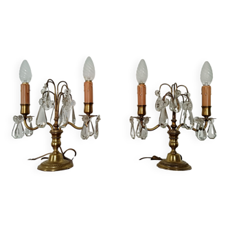 Pair of bronze girandoles with crystal pendants, two arms of lights.
