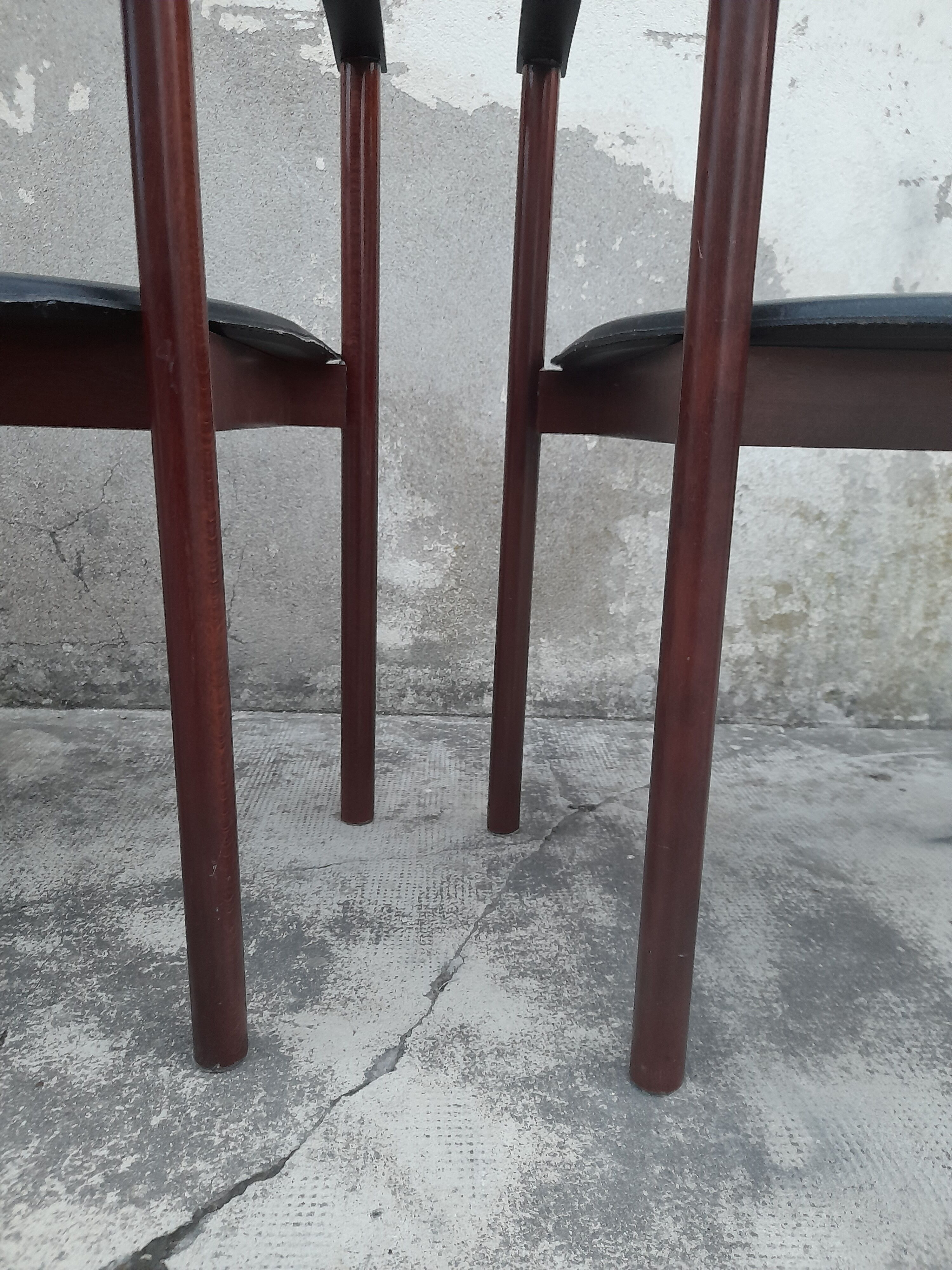 Pair of Scandinavian armchairs in teak and leather