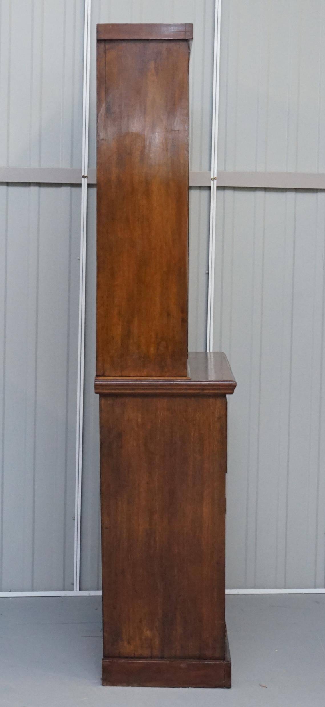 Light wood library with a secretary and leather surface.