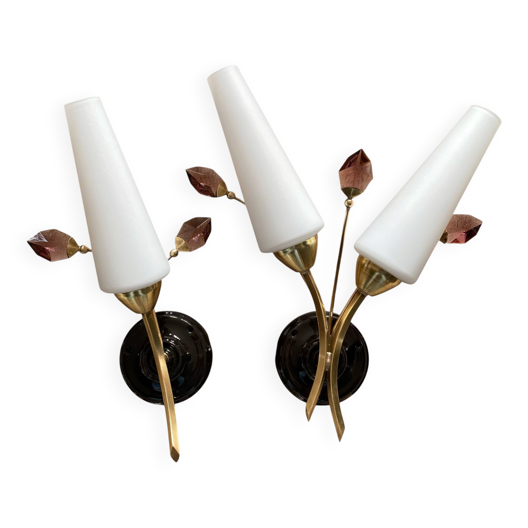 Pair of wall sconces in brass with white glass tulips.