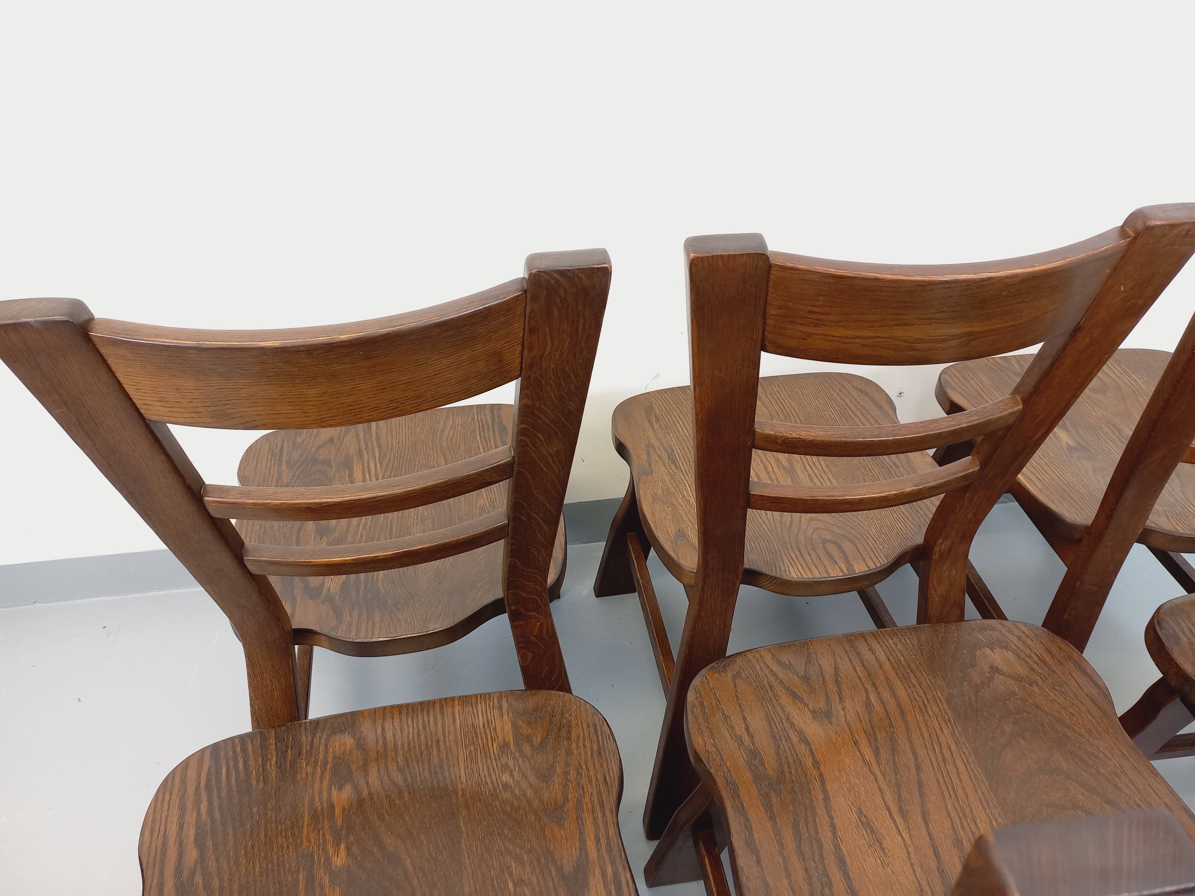 Set of 6 vintage brutalist oak chairs from the 1950s.