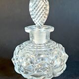Old perfume bottle in molded
