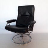 Scandinavian armchair in swivel leather