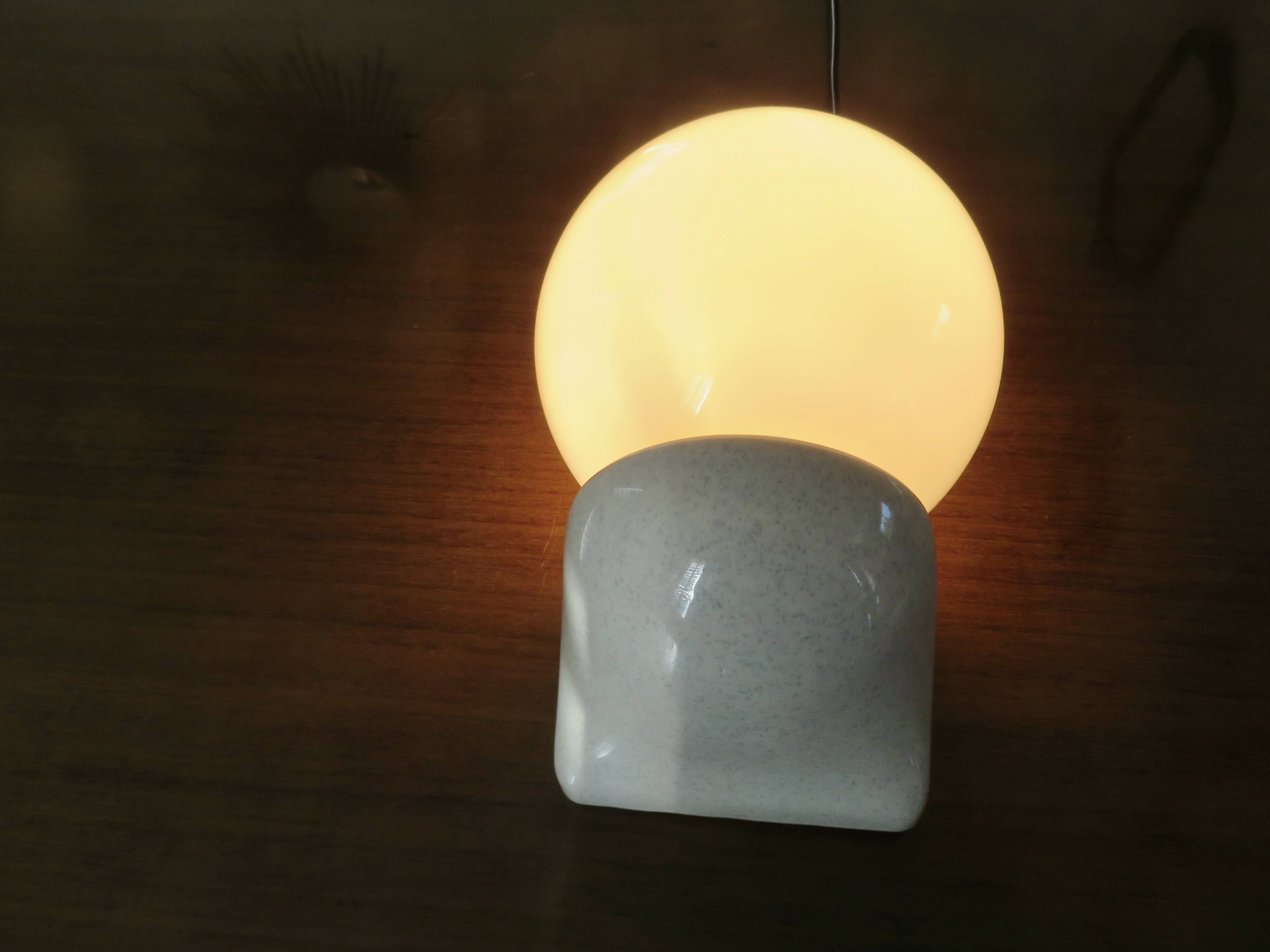 Pair of streamline opaline wall lights from the 80s