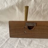 Vintage wooden wall-mounted coat rack with 3 golden cast aluminum hooks