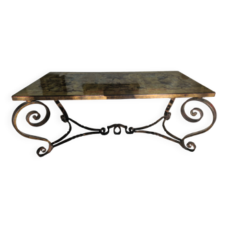 1950s wrought iron coffee table with eglomised glass top