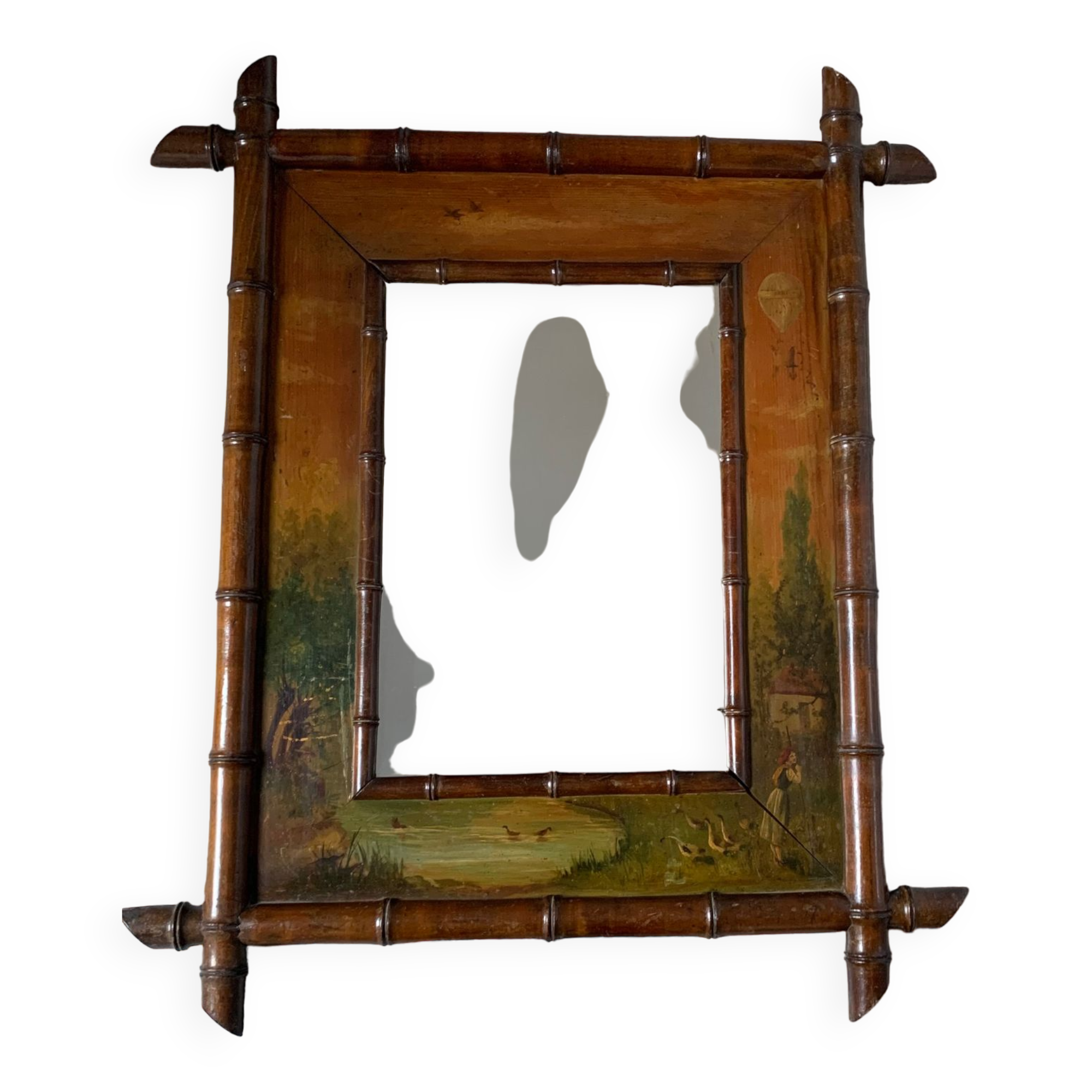Bamboo wood mirror and 19th-century paintings