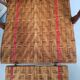 Sunbathing sunbathing in wicker rattan wood deckchair red lounger