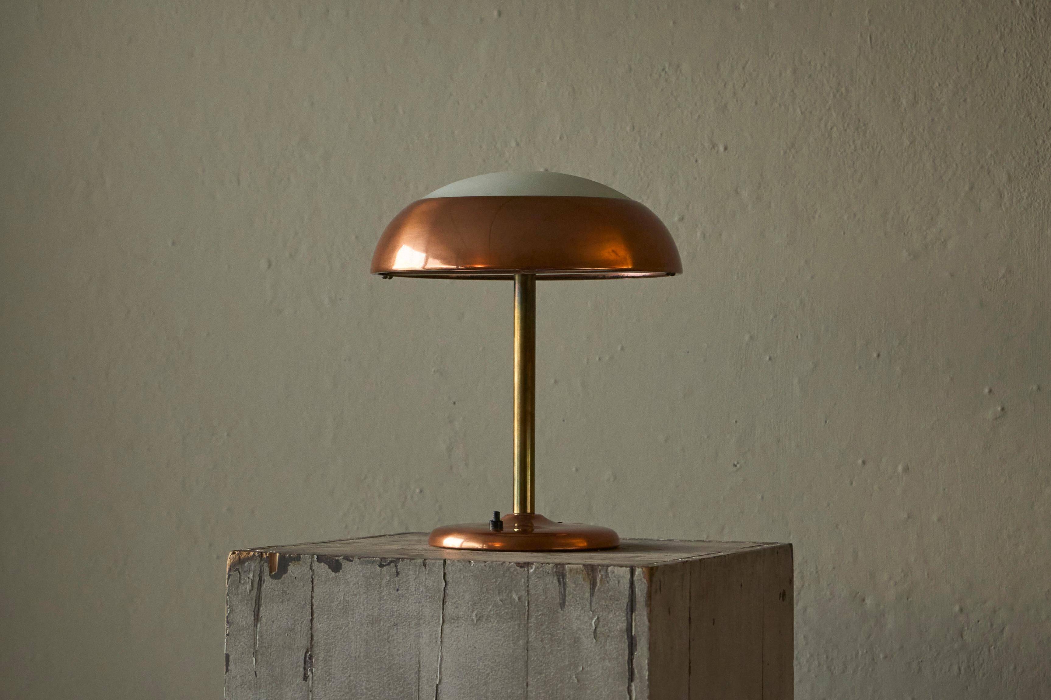 Art Deco table lamp in patinated copper, brass, and satin glass from the 1950s.