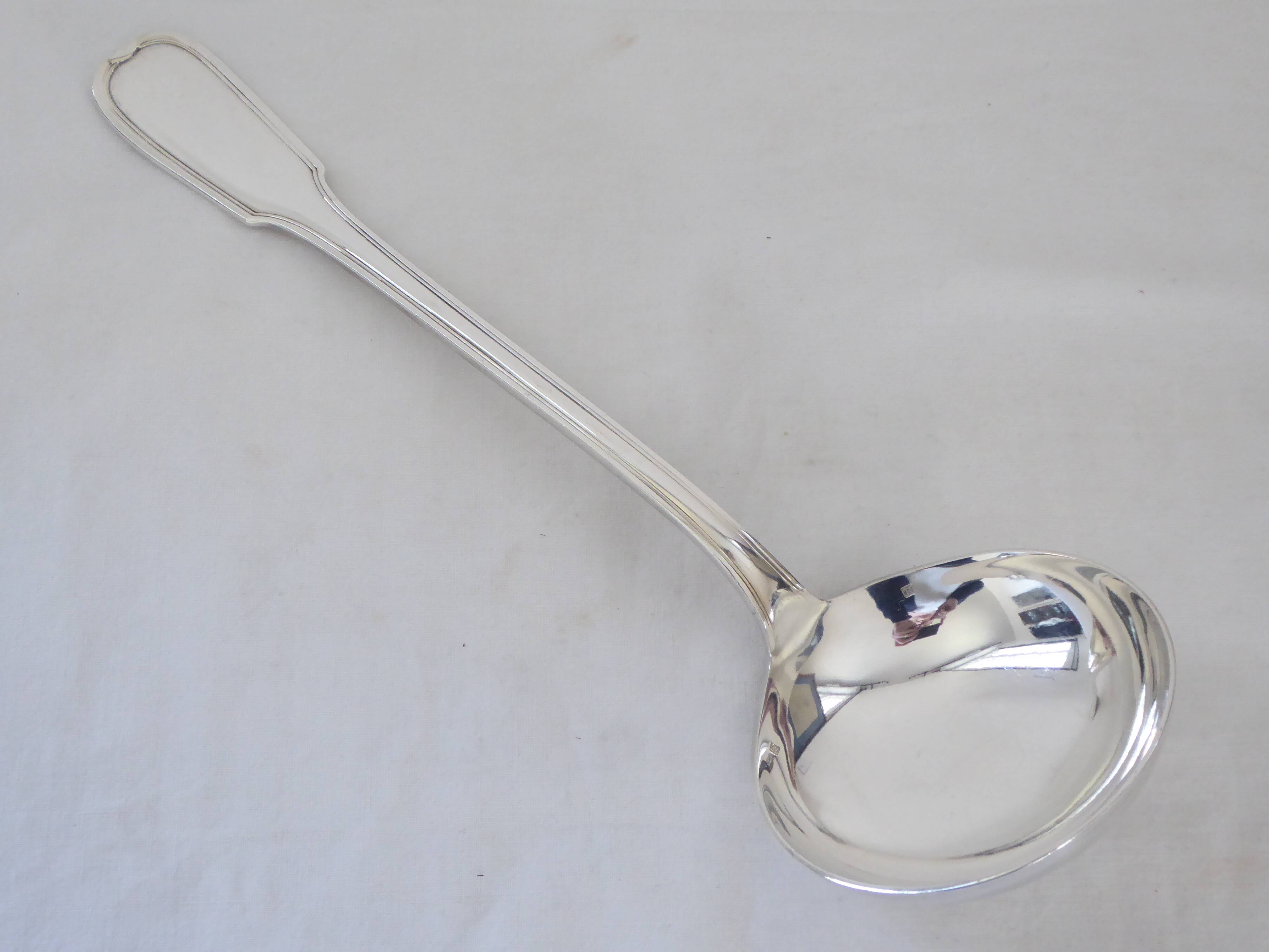 Silver metal ladle
