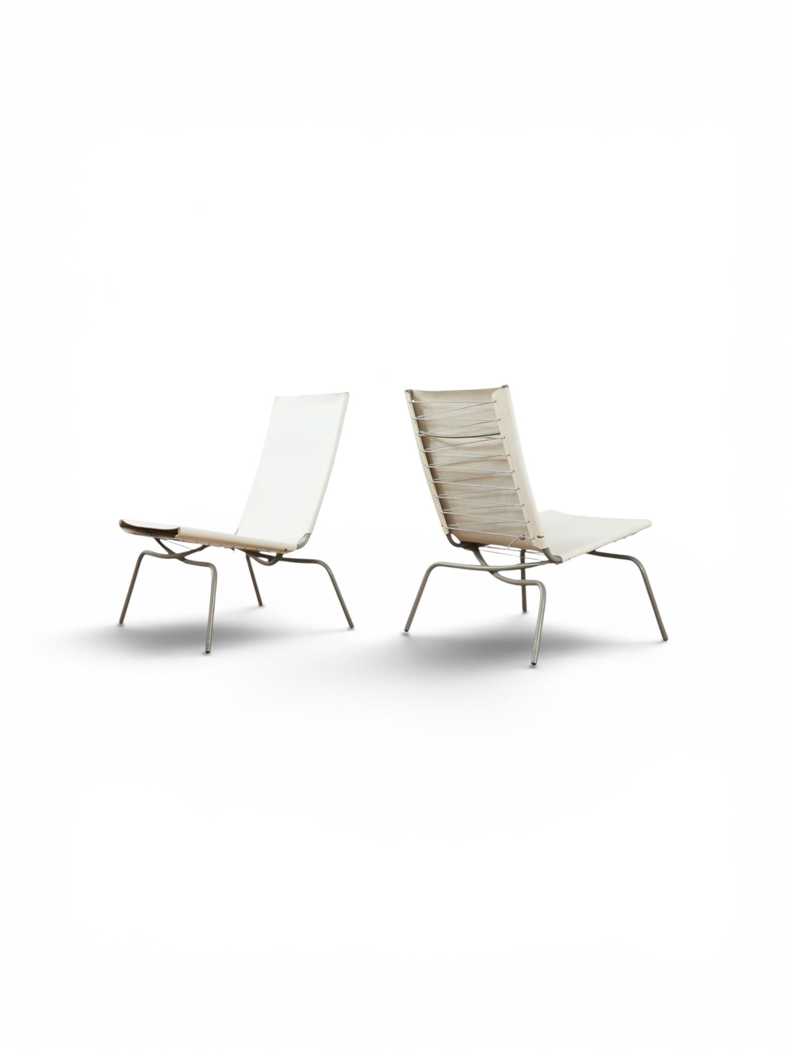 Set of 2 Crossed Legged lounge chairs by Fabiaan van Severen.