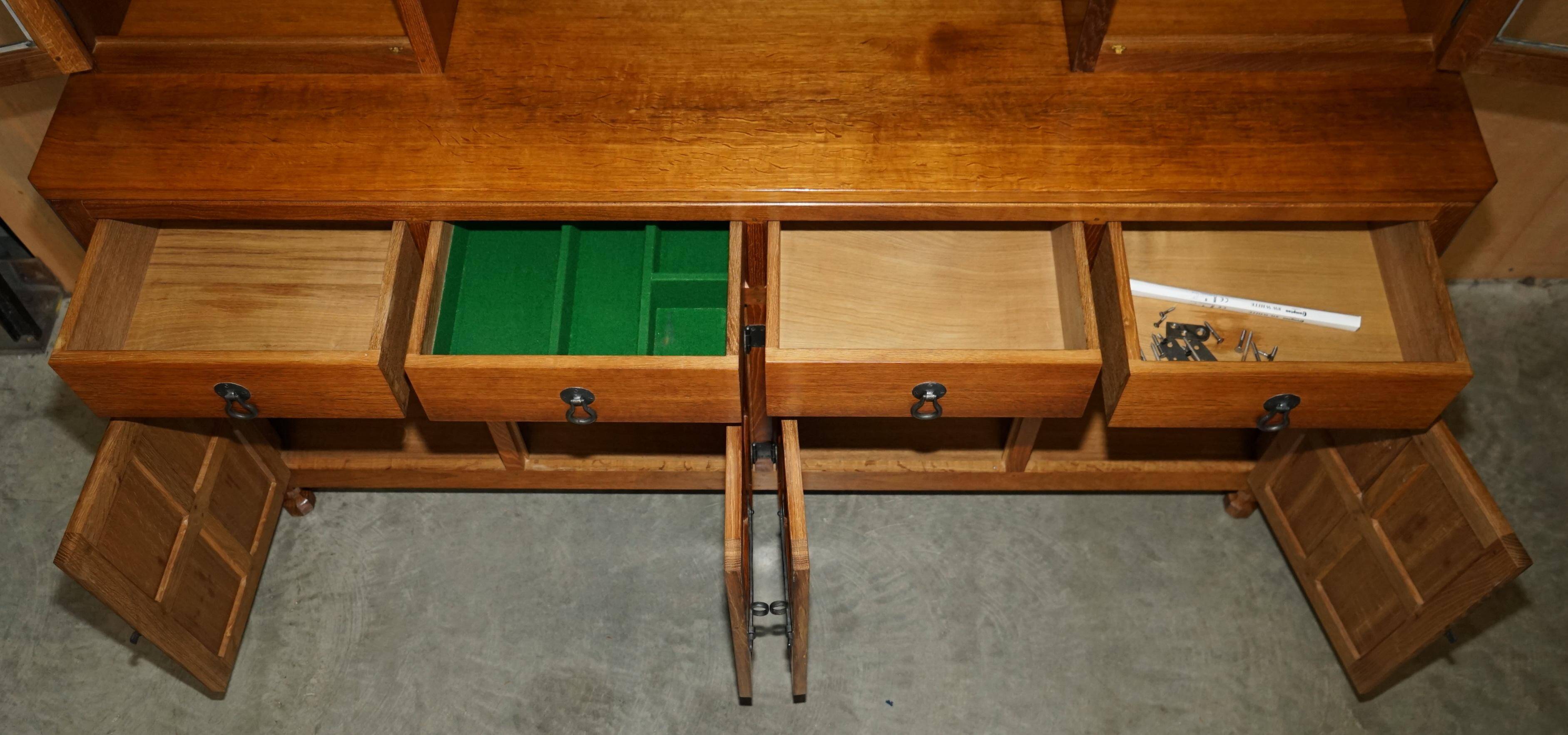 Vintage Robert Mouseman Thompson oak display cabinet with shelves and lighting.