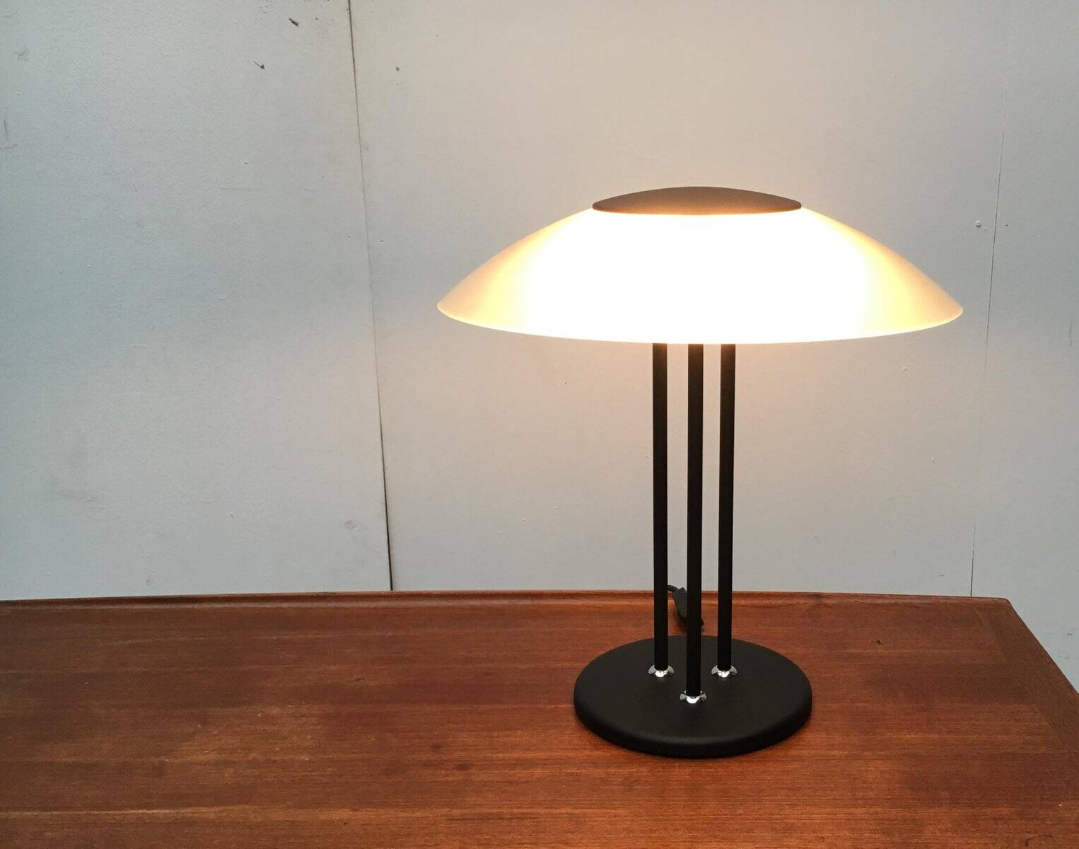 Vintage postmodern table lamp in glass and metal.
