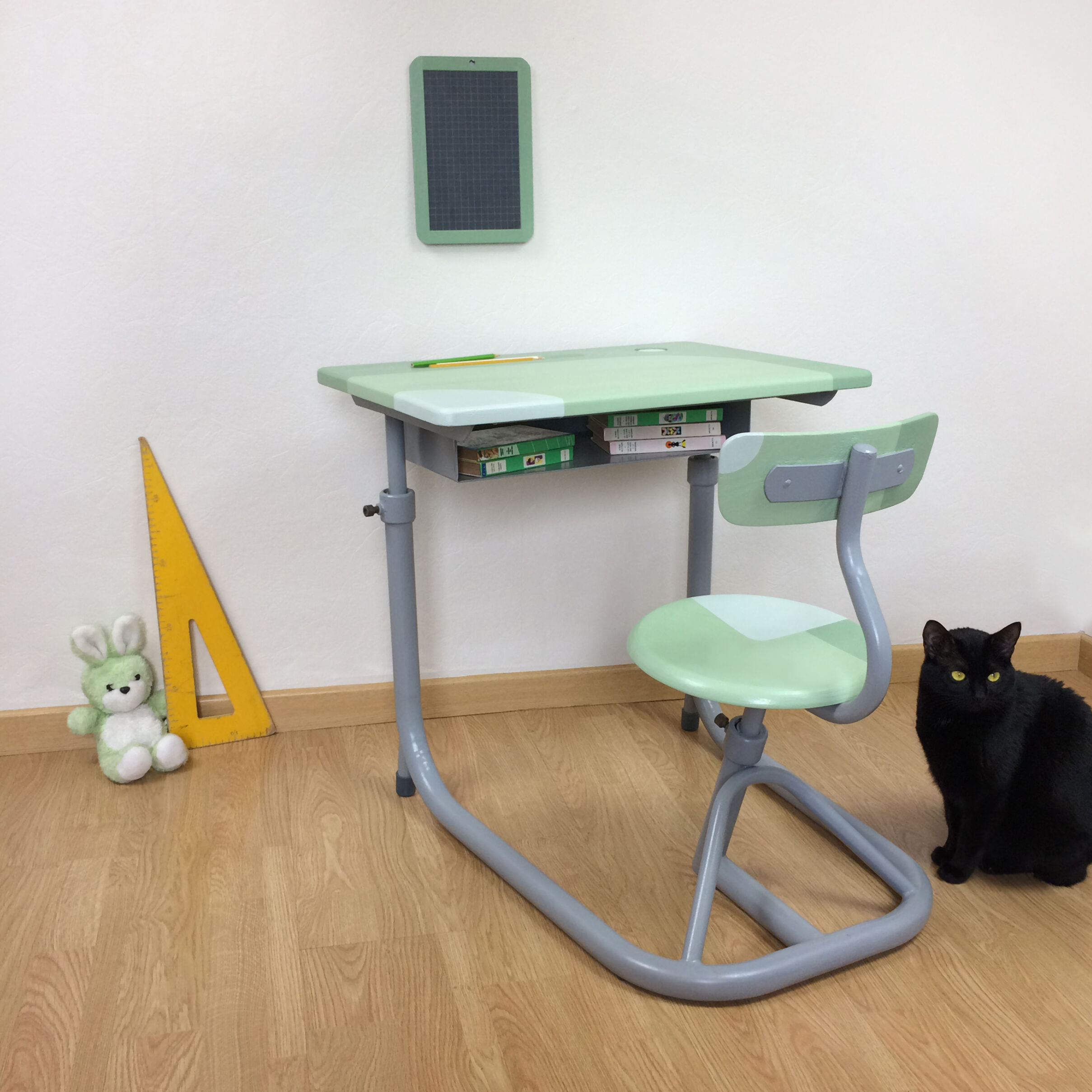 Adjustable green and grey school desk