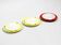 Three round 1950s wall or ceiling lamps made of metal and plexiglass shades