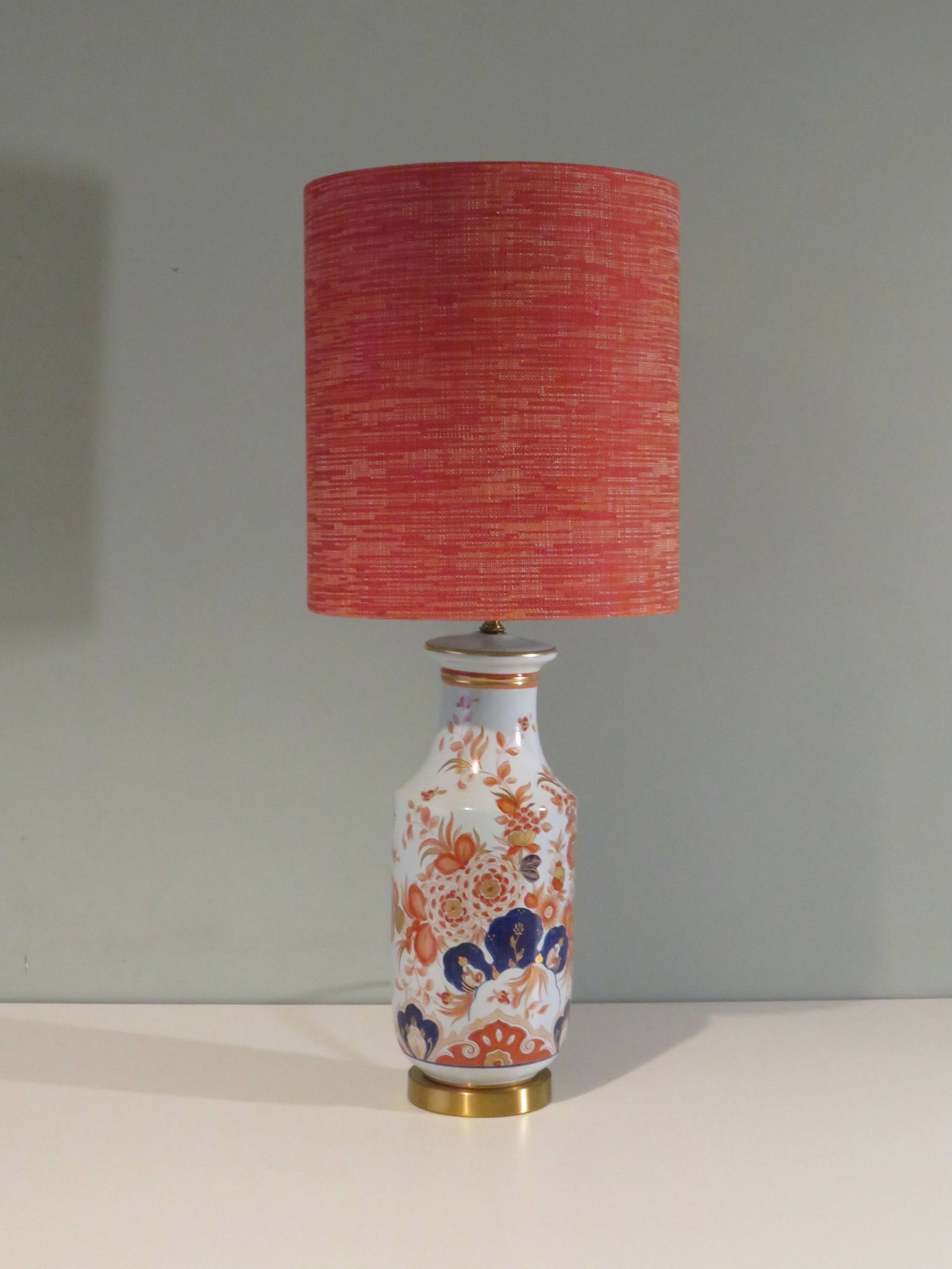 Vintage ceramic table lamp with an Imari-inspired pattern.