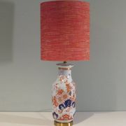 Vintage ceramic table lamp with an Imari-inspired pattern.