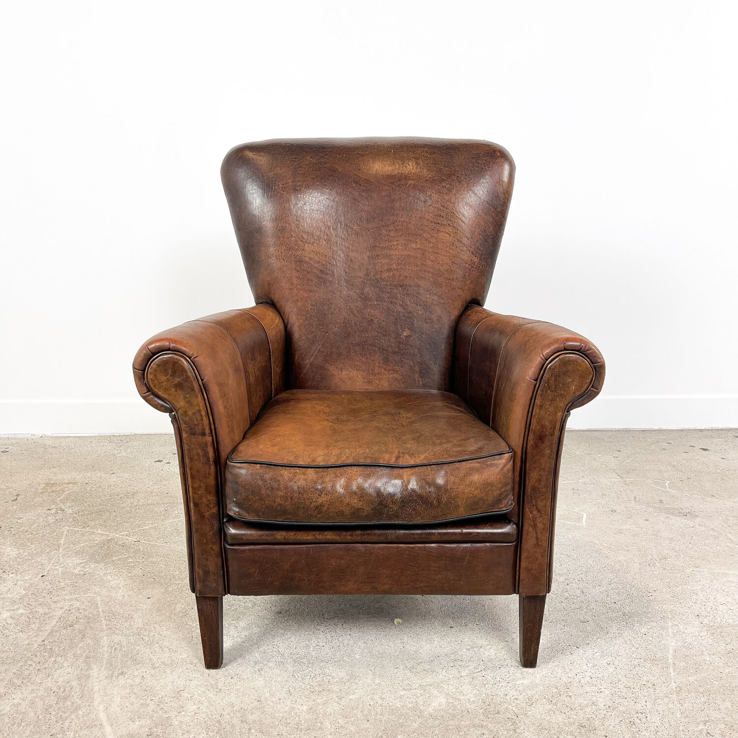 Vintage dark sheep leather club chair Achterdijk