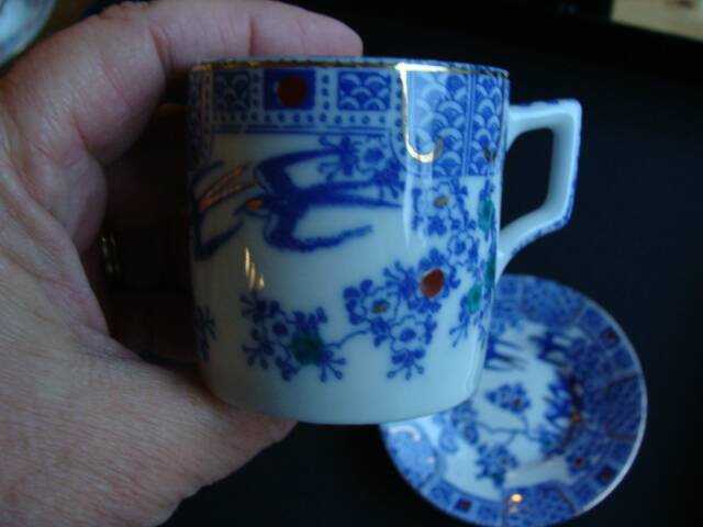Asian Swallow Cup and Saucer