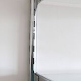 Chrome and glass wall shelf, circa 1960