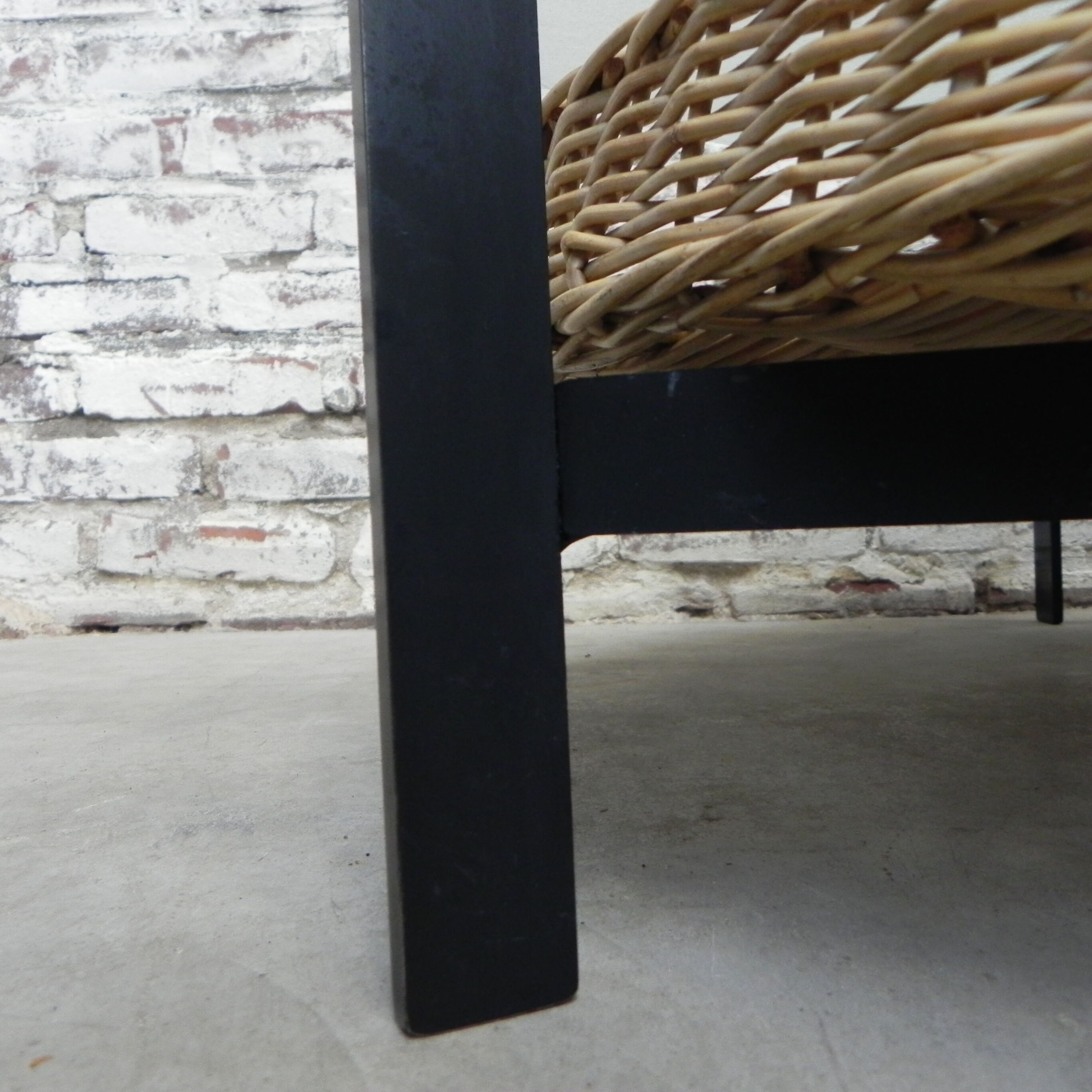 Vintage coffee table with glass top and rattan basket