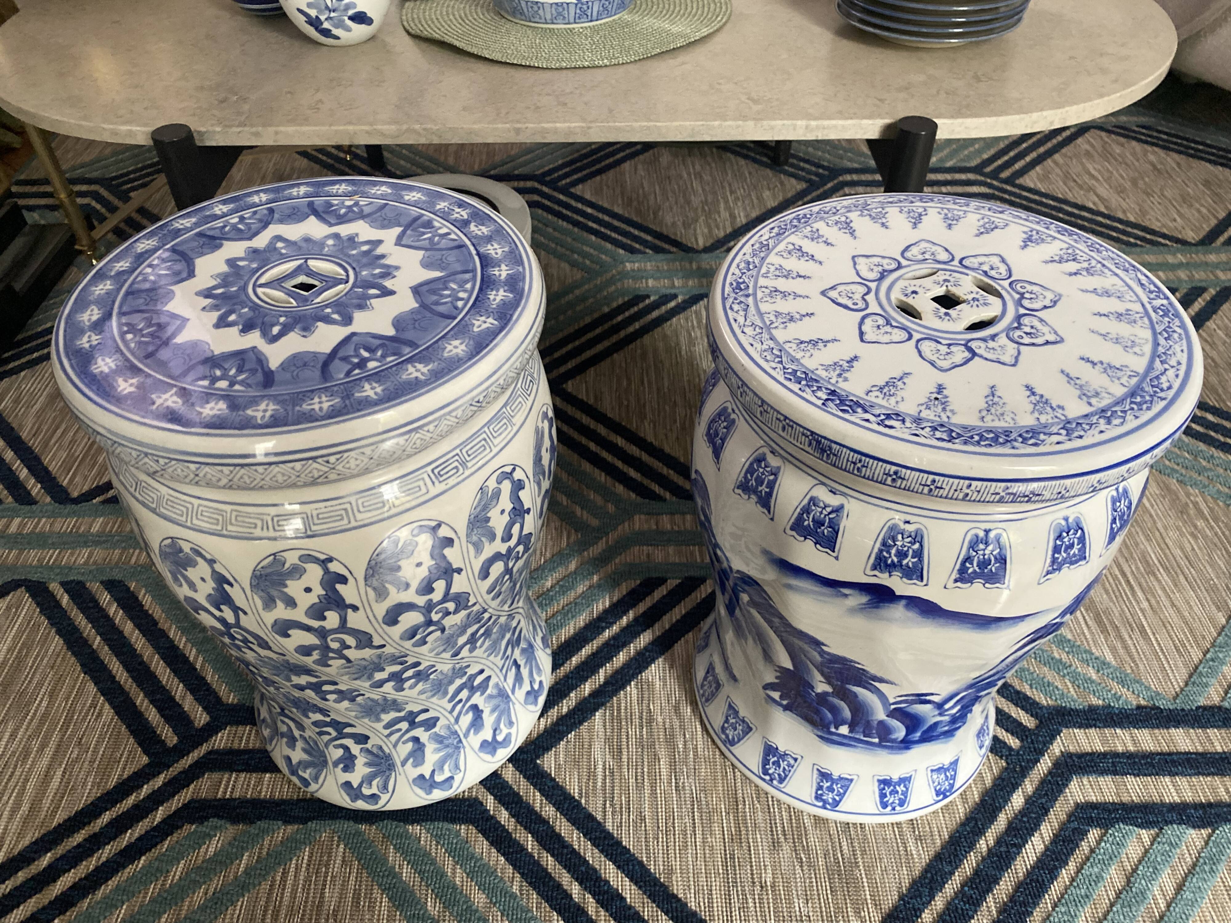 Set of two white and blue porcelain side tables.