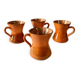 4 large orange enameled ceramic cups, signed