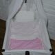 Former cradle swing and bars on wheels