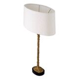 Pair of table lamps, patinated brass finish and black granite base, beautiful quality and sought-after style.