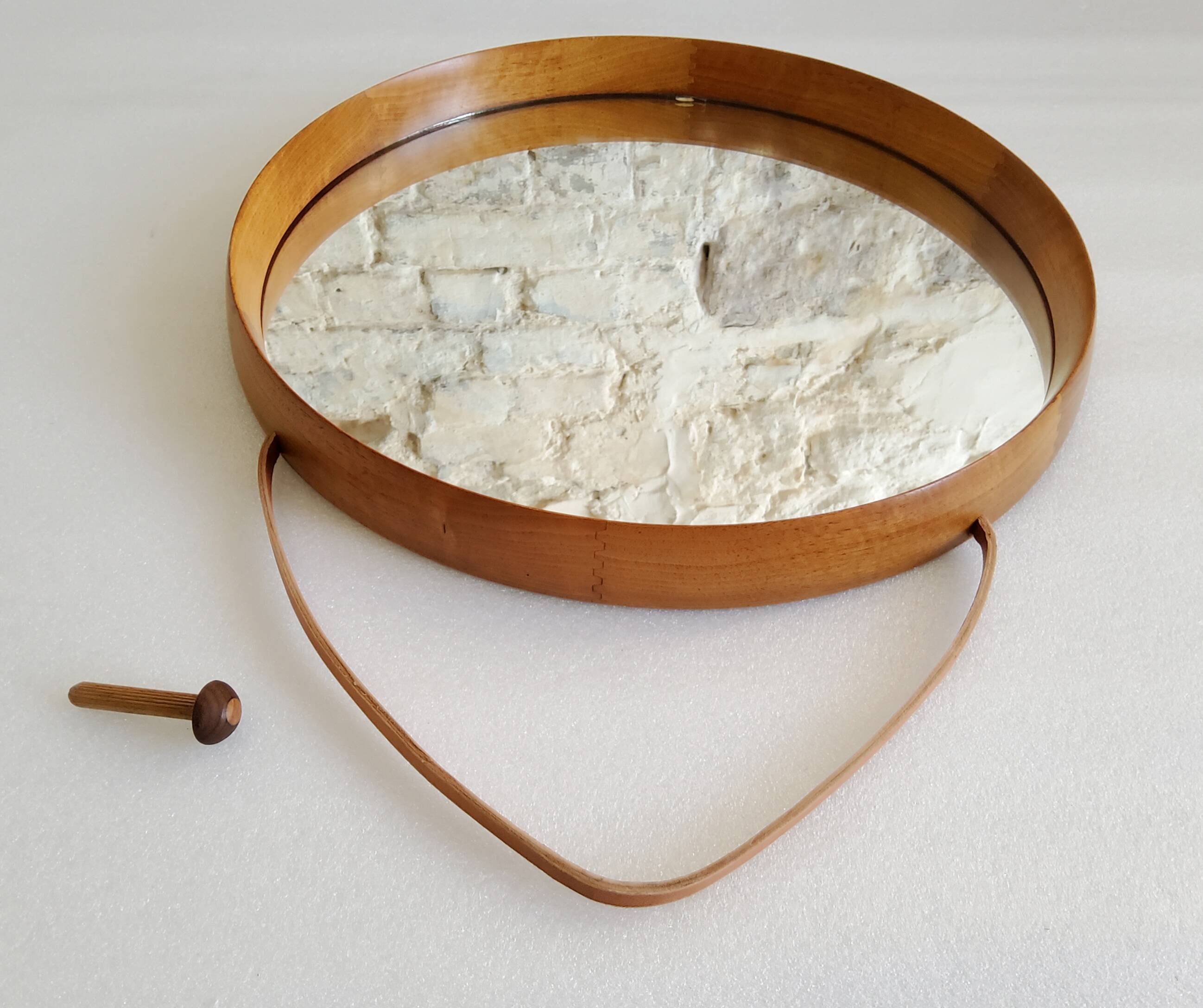 Round teak mirror by Uno and Osten Kristiansson for Luxus Vittsjö, Sweden.