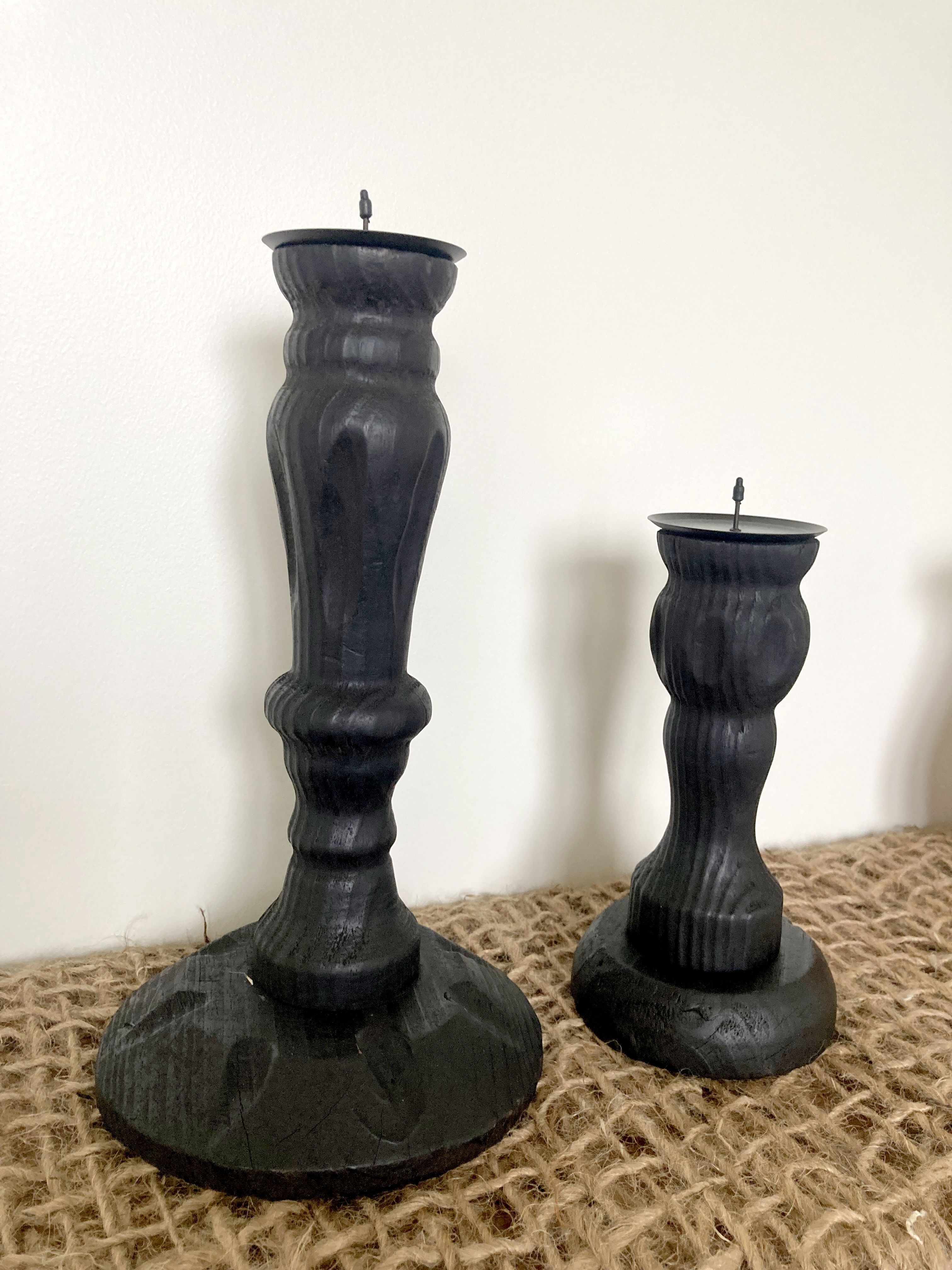 Black wooden candlesticks
