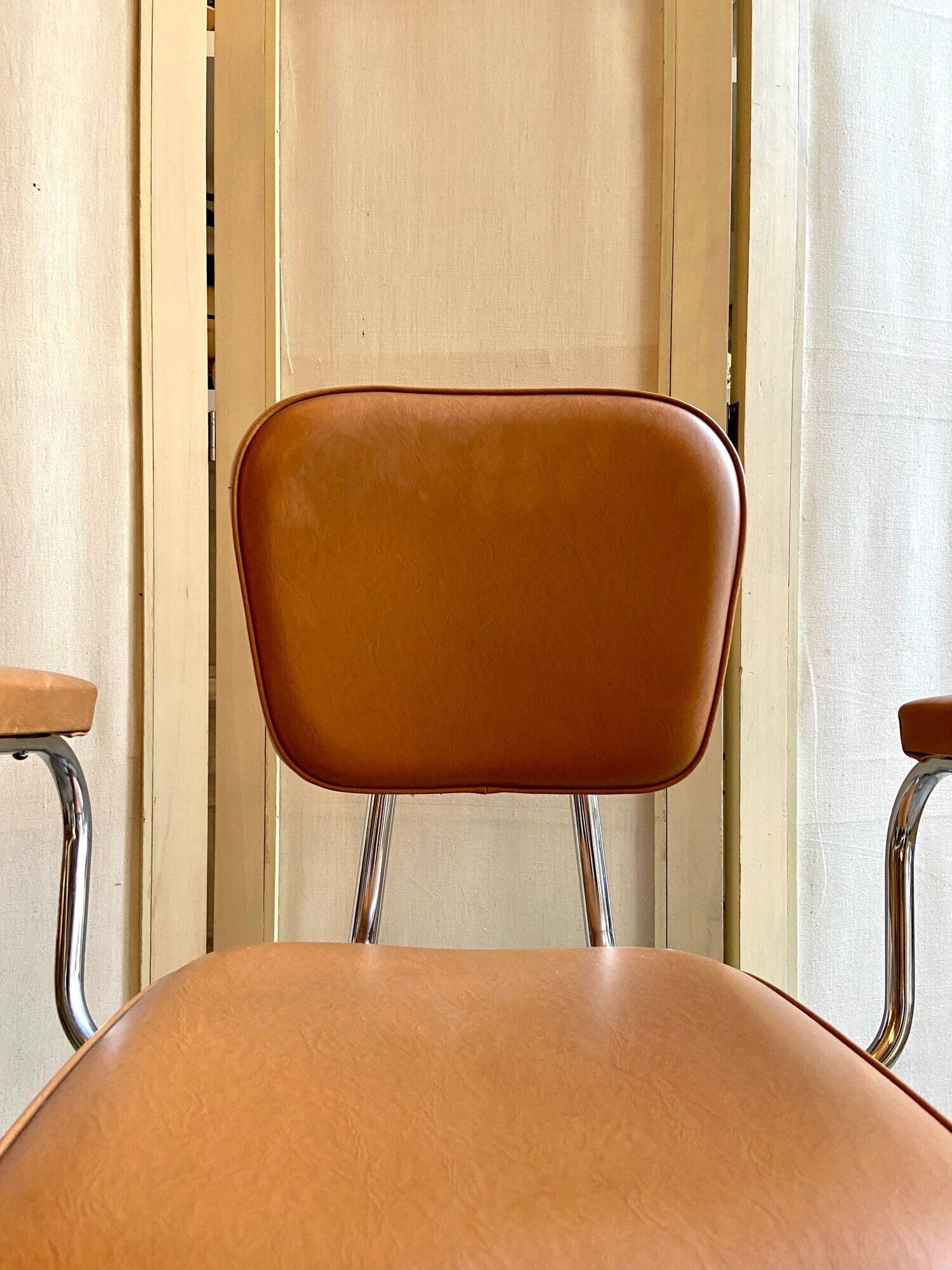Armchair in chromed metal and tawny skaï 1950s