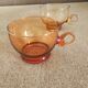 Set of four vintage amber glass cups