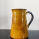 Vintage glazed terracotta pitcher