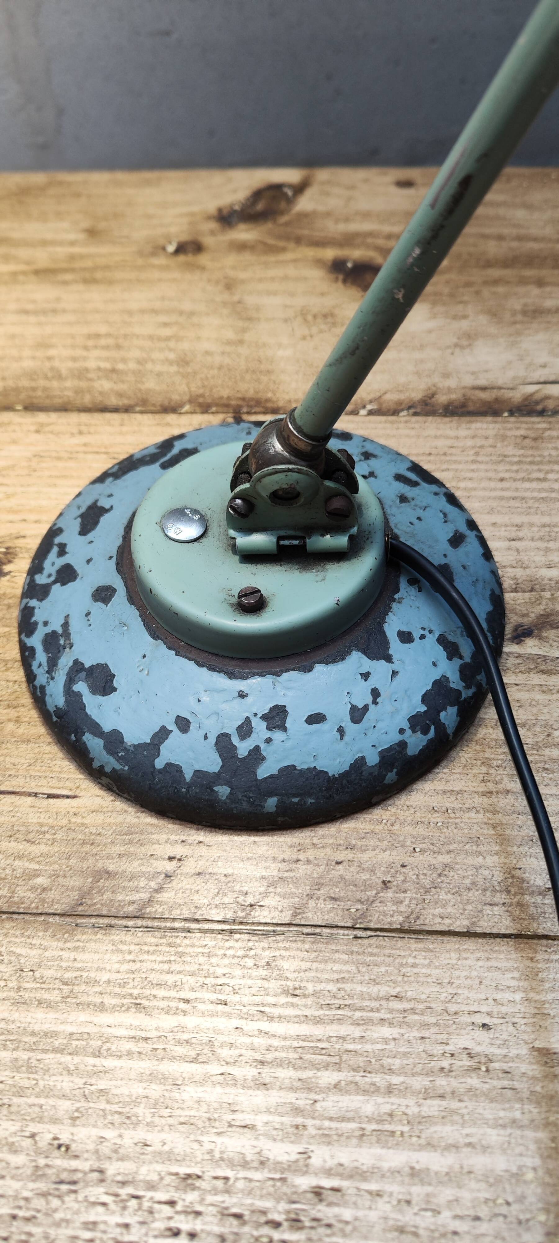 Old green industrial desk lamp