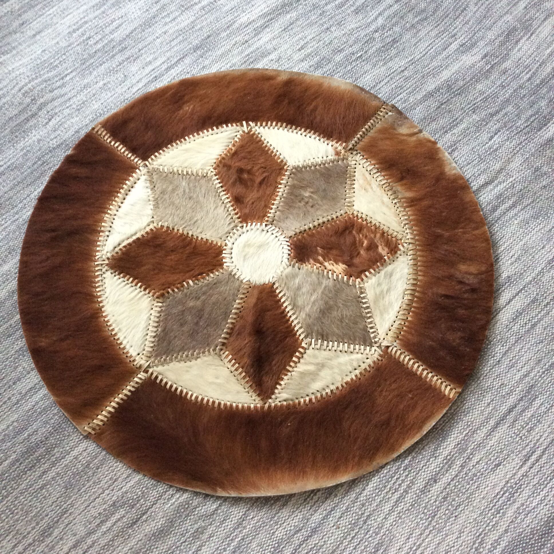Vintage round cowhide carpet from the 60s and 70s