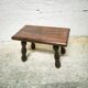 Turned wooden footrest