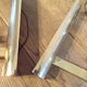 Pair of golden Sciolari House wall light
