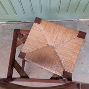 4 straw chairs.