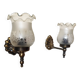 Pair of wall sconces in bronze with opaline glass tulips.