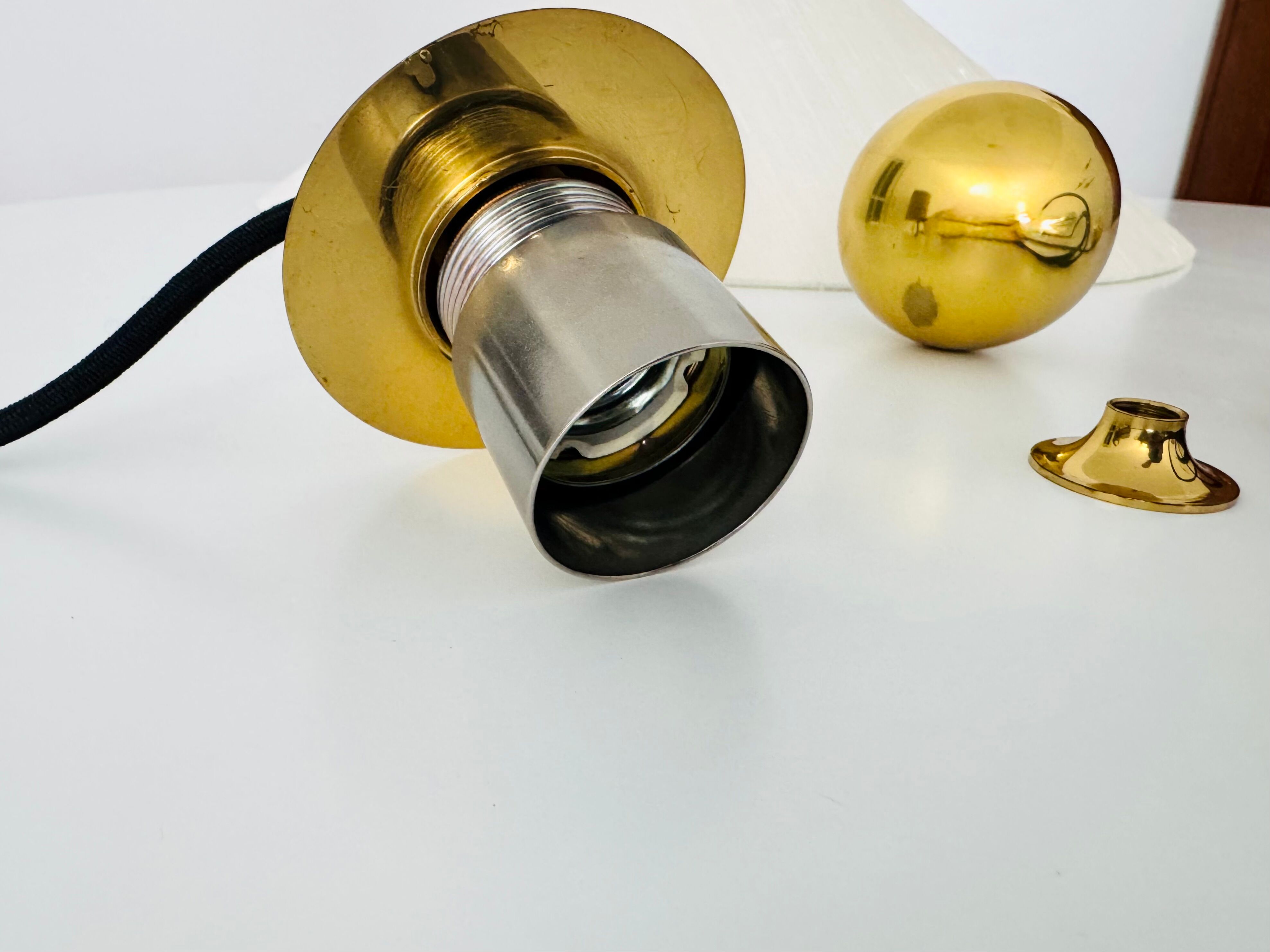 Large Adjustable Brass Pendant Lamp with Counterweight by Florian Schulz