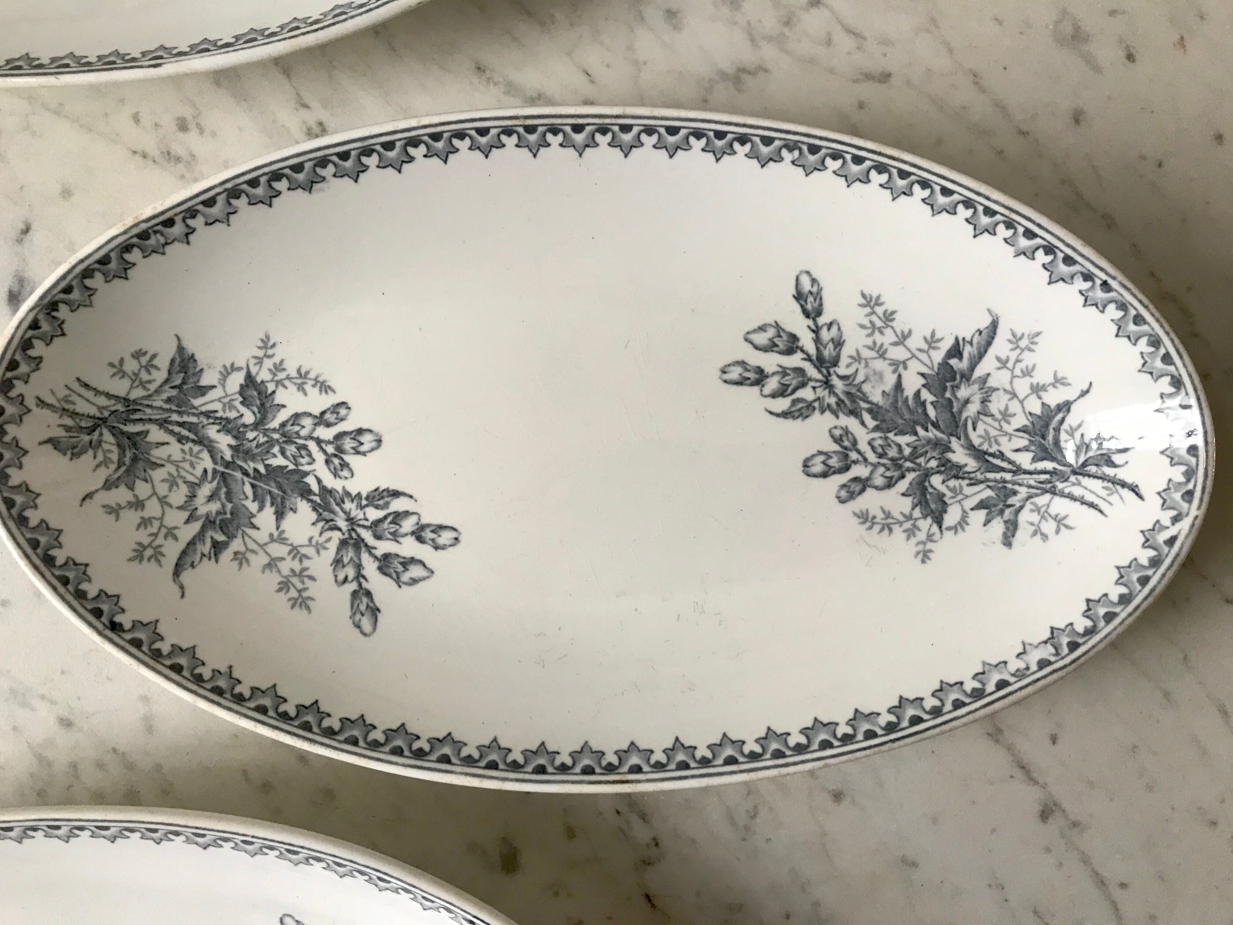 Trio of raviers Terre de Fer Société Céramique Maestricht model Thistle made in Holland late nineteenth