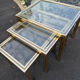 Nested tables by Pierre Vandel Paris in gilded metal and glass, 1970s.