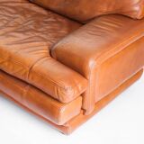 Vintage three-seater leather sofa. Edition by Roche Bobois. France, 70s-80s