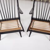 Paire de fauteuils laqués noirs 1950s