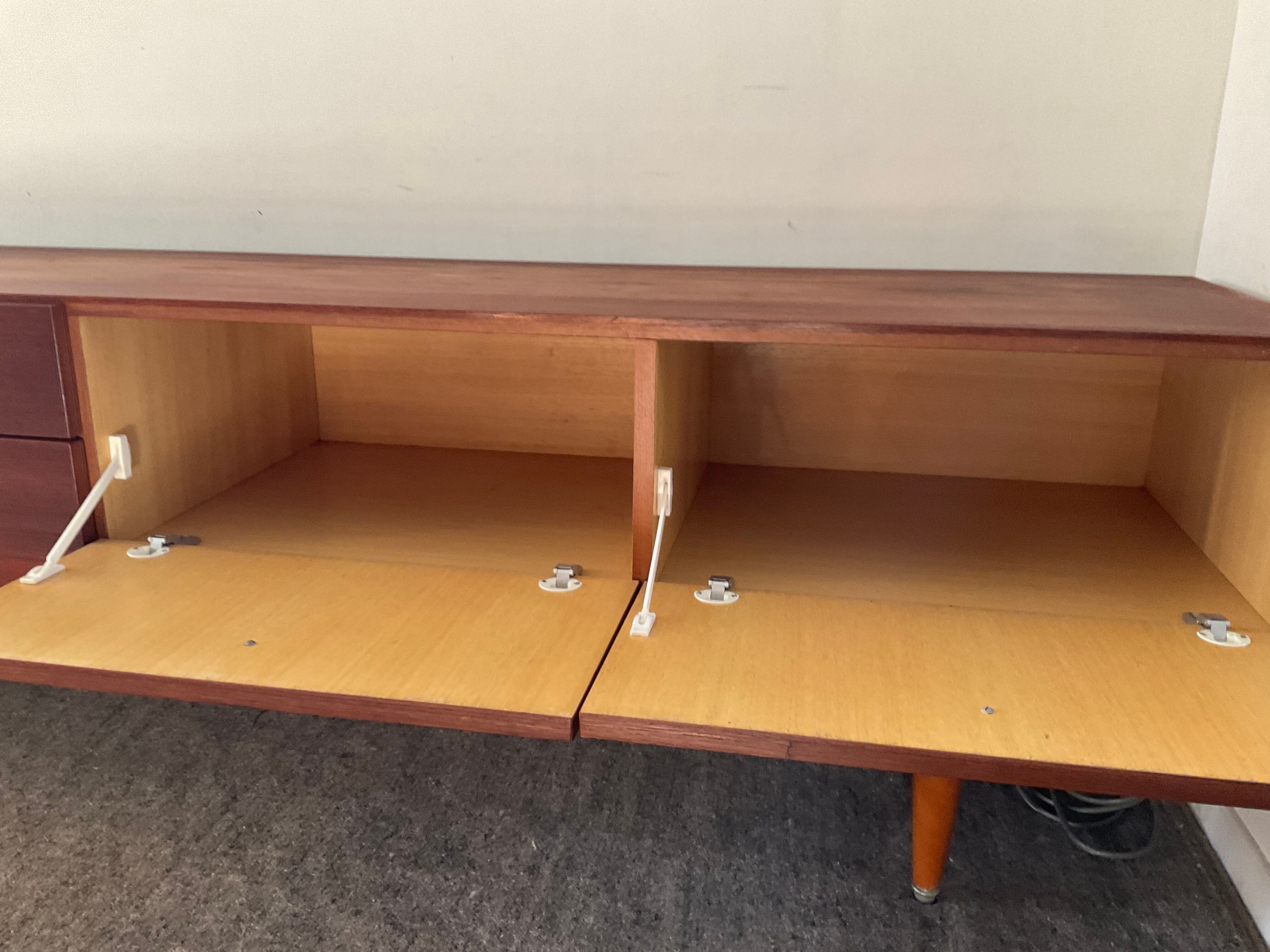 Scandinavian teak row from the 60s and 70s