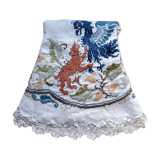 Round embroidered linen tablecloth