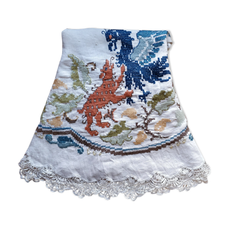 Round embroidered linen tablecloth
