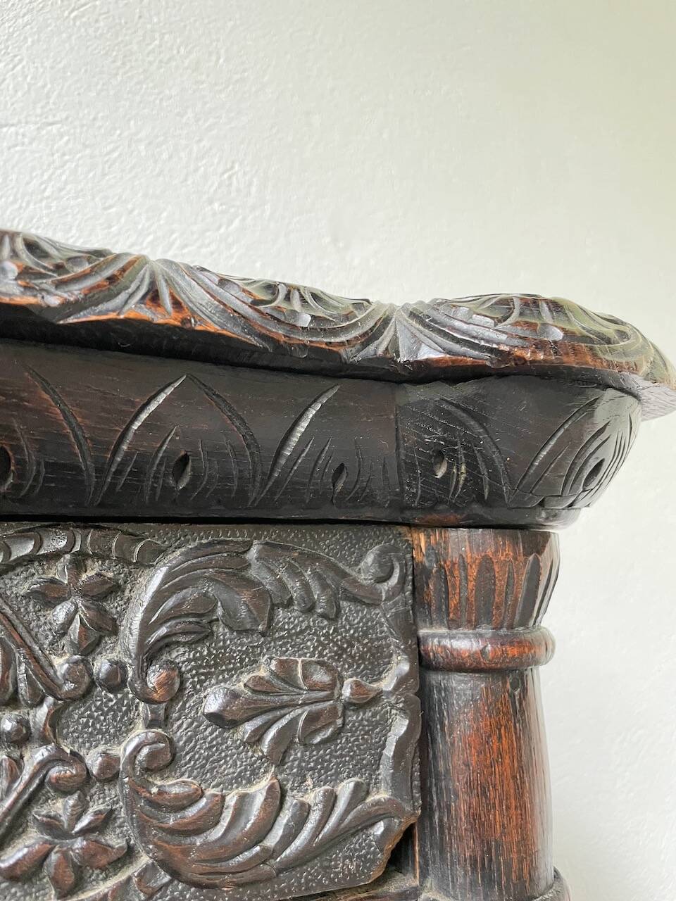 19th century chest of drawers in carved blackened pine