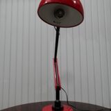 Red desk Guzzini lamp of the 1970s Italy